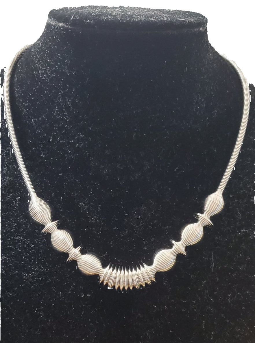 Collana Acciaio di filo arrotolato effetto molla