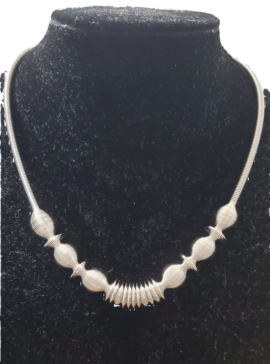 Collana Acciaio di filo arrotolato effetto molla